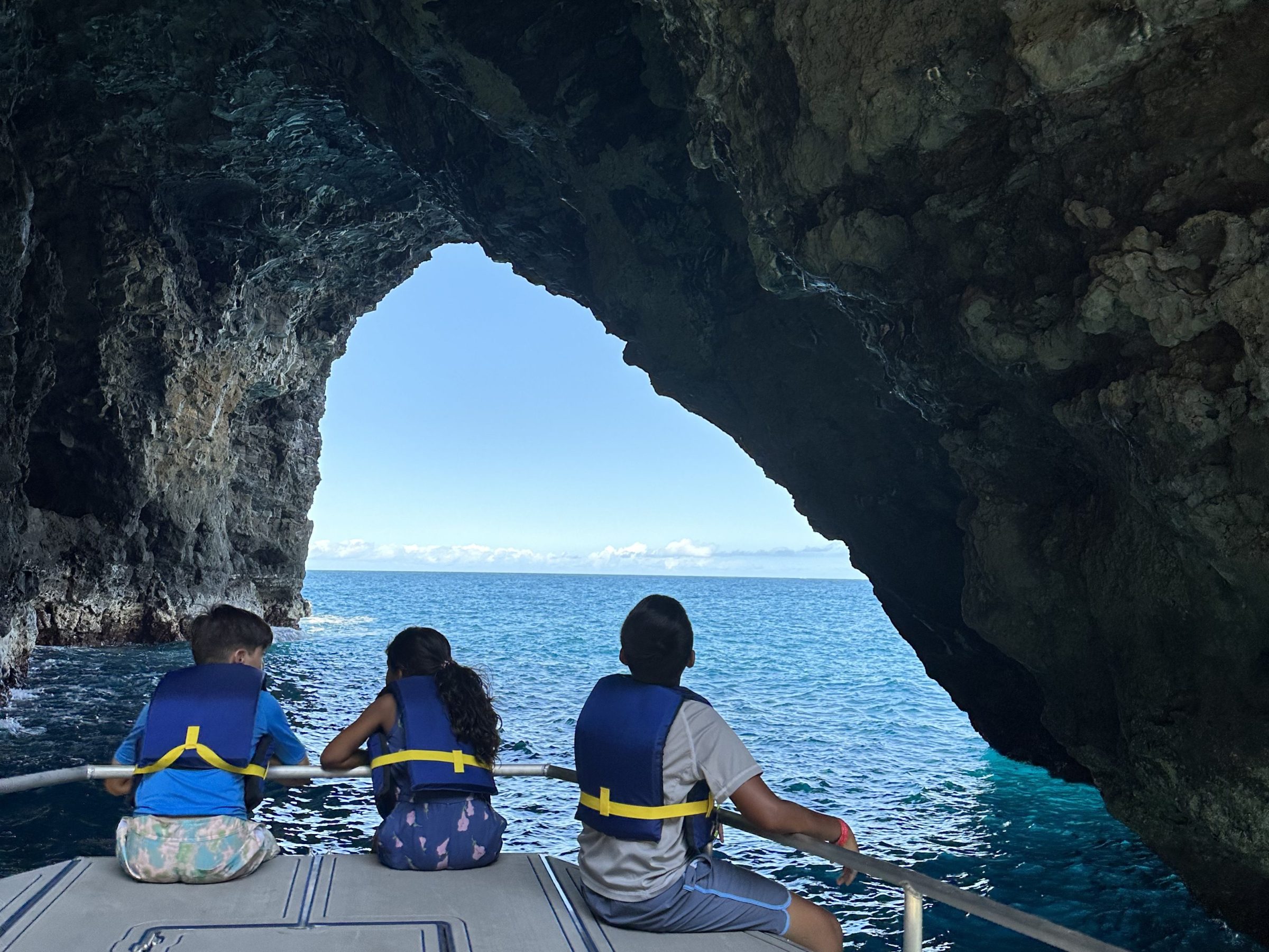 a group of people standing on a bridge