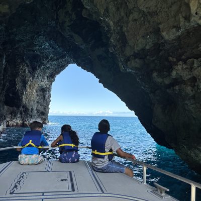 a group of people standing on a bridge